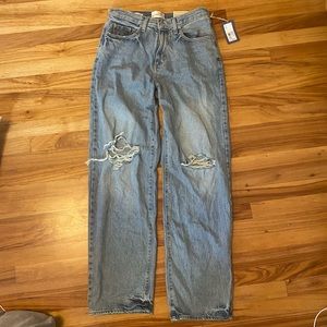 Ripped blue 90’s baggy jeans